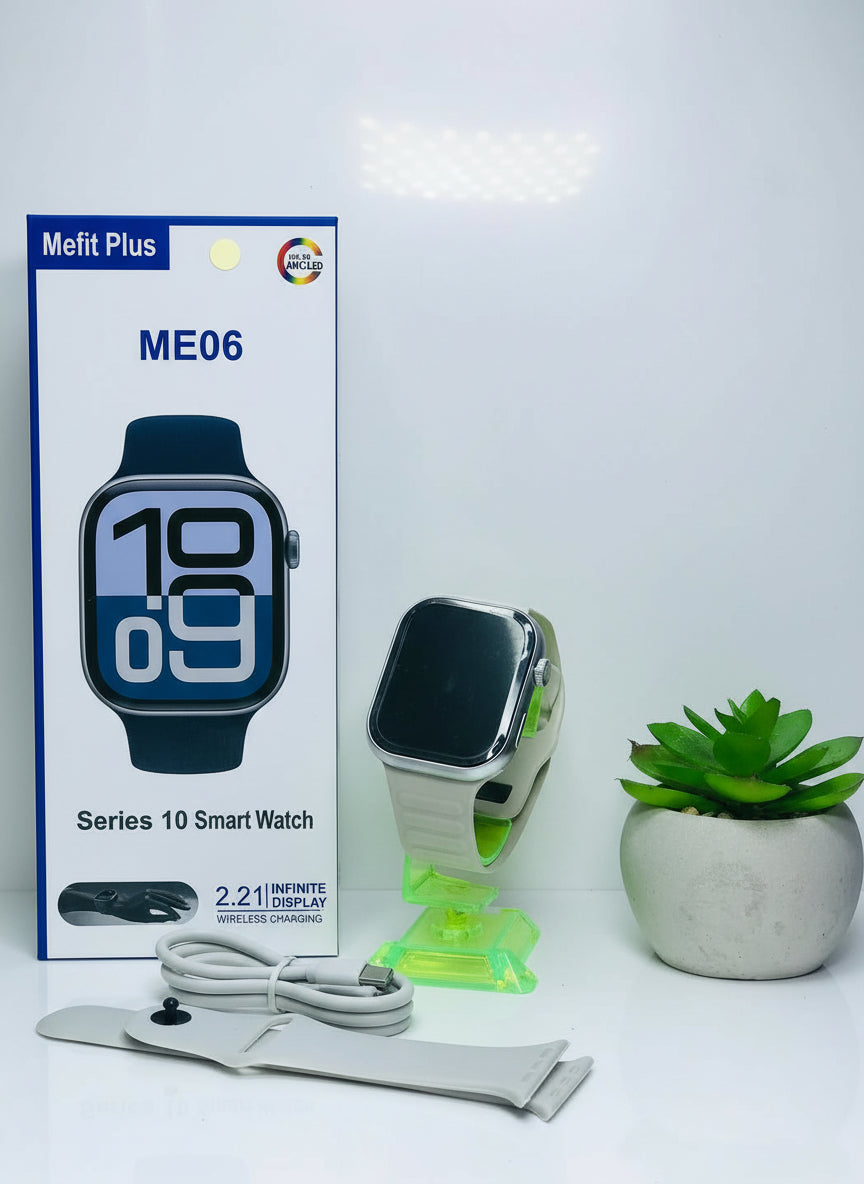 Smart watch with packaging and a plant on a marble surface