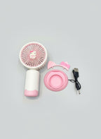 Pink handheld fan with accessories on a gray background